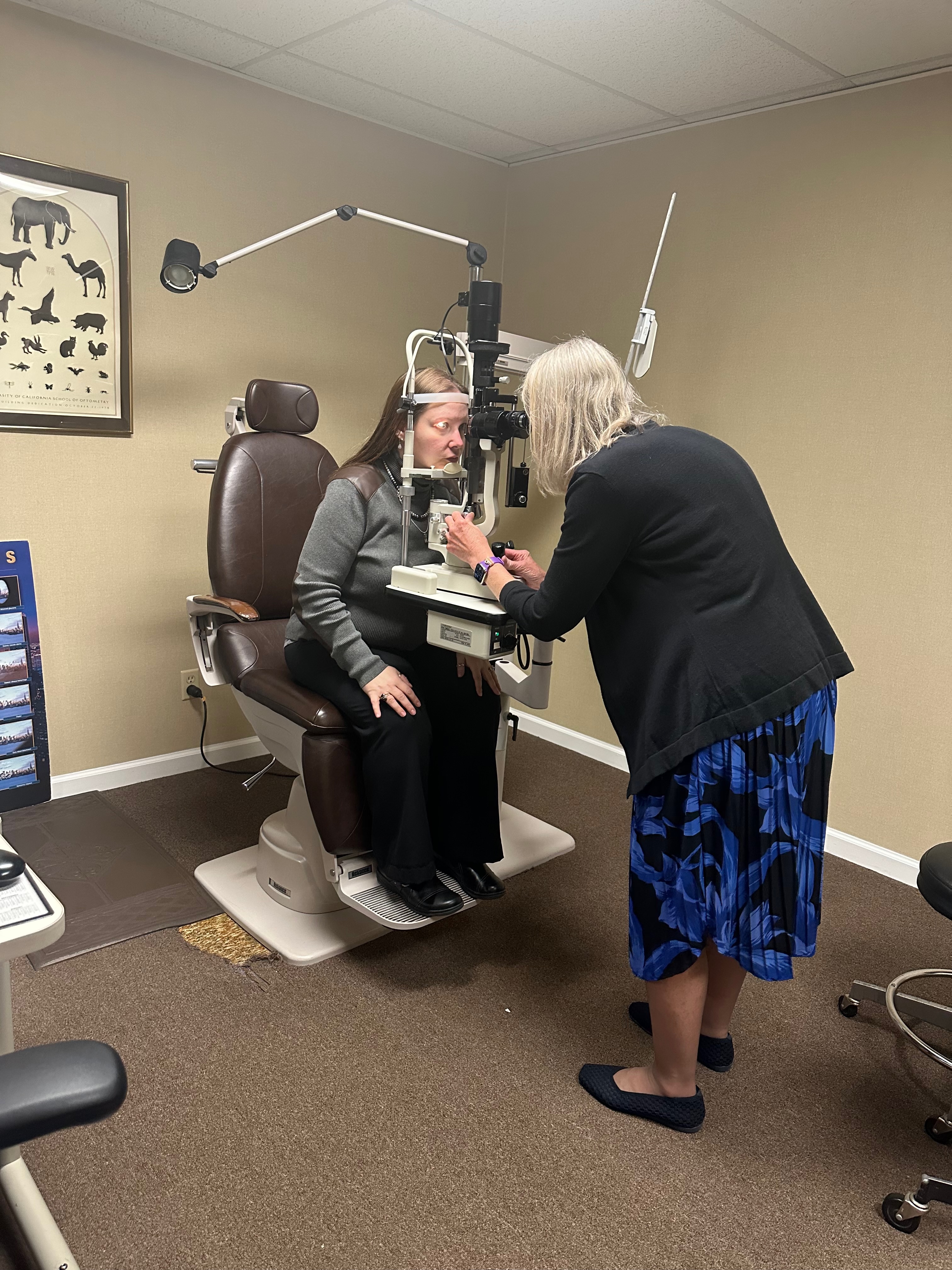 Dr. Patricia Gelner at the slit lamp evaluating a contact lens fitting